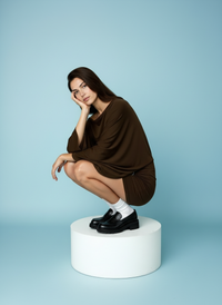 One-shoulder top met ceintuur