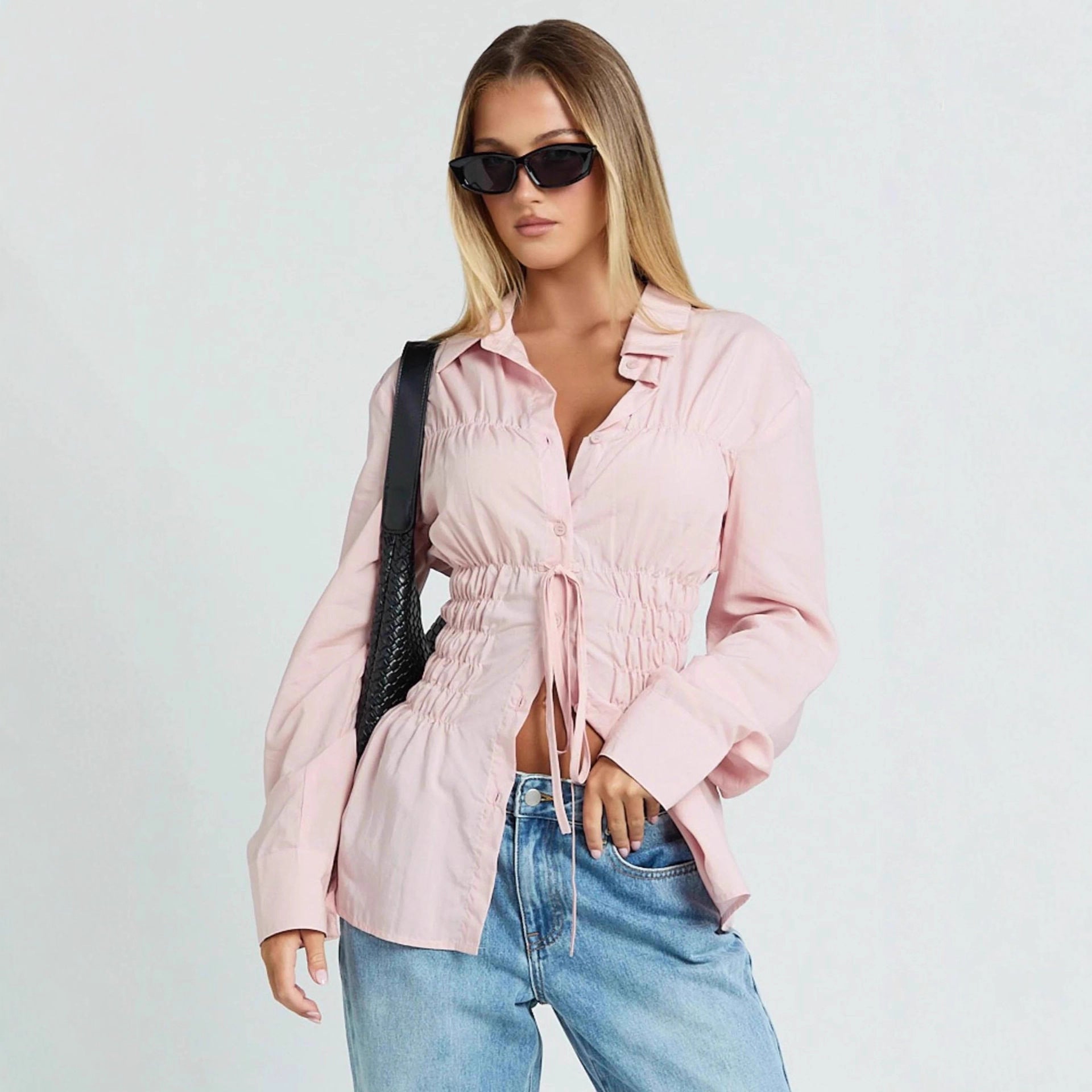 Stijlvolle elegante reversblouse voor dames met geplooide details en lange mouwen