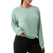 Loszittende atletische top met lange mouwen voor dames