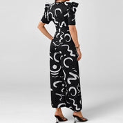 Stijlvolle en chique jumpsuit met V-hals en cindede taille en wijde pijpen