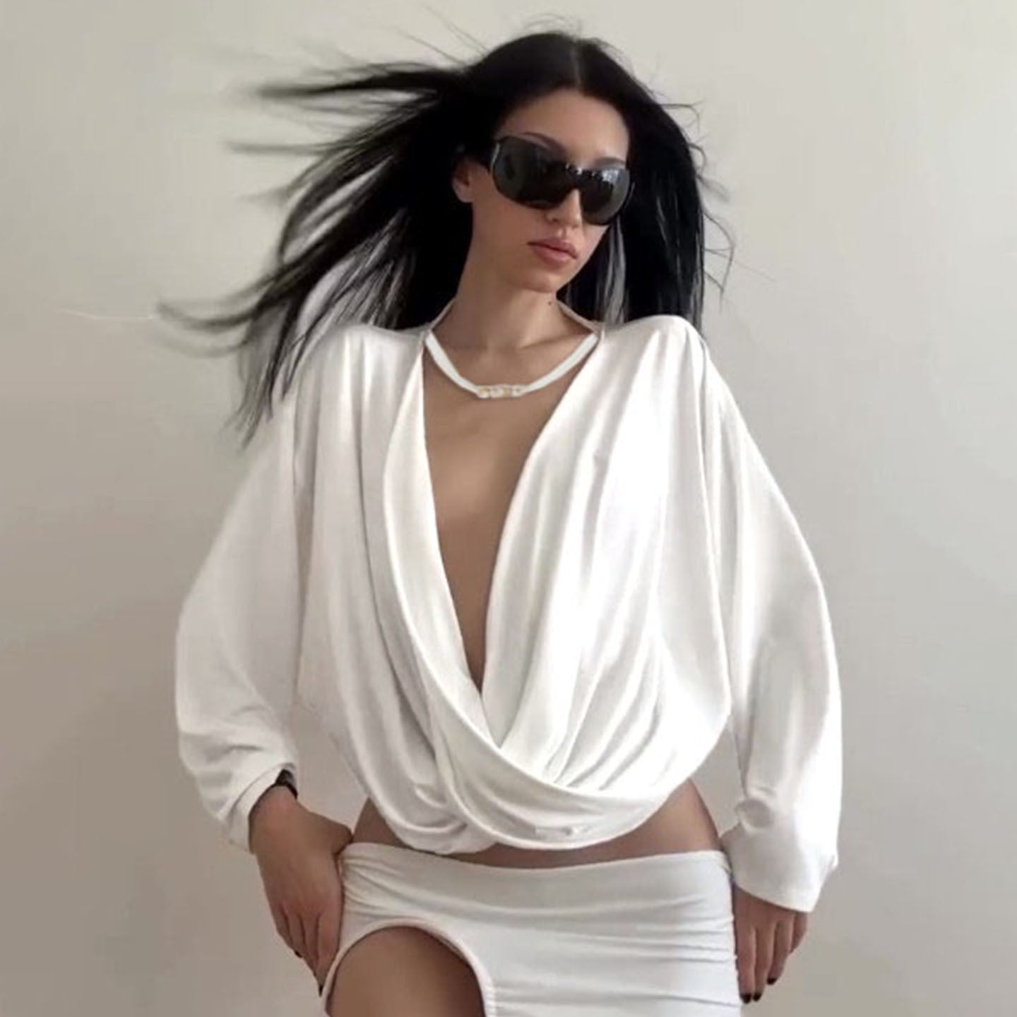 Casual getailleerde top met lange mouwen die je flattert