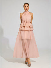 Vloeiende trouwjurk met ruches en een halterhalslijn