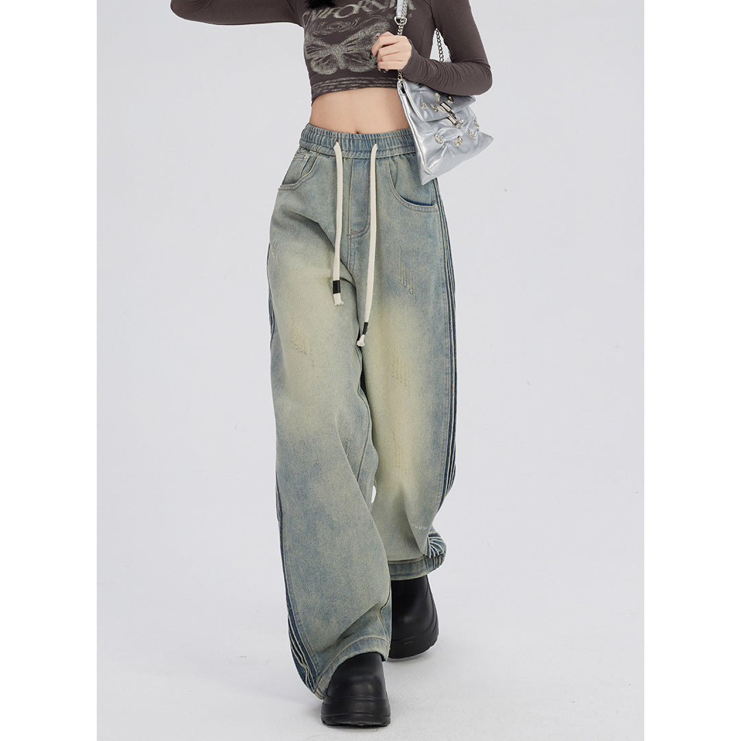 Jeans met elastische taille met rimpelontwerp aan de zijkant