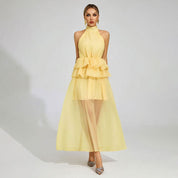 Vloeiende trouwjurk met ruches en een halterhalslijn