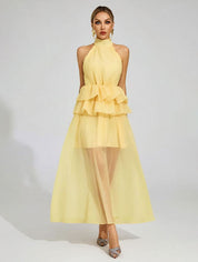 Vloeiende trouwjurk met ruches en een halterhalslijn