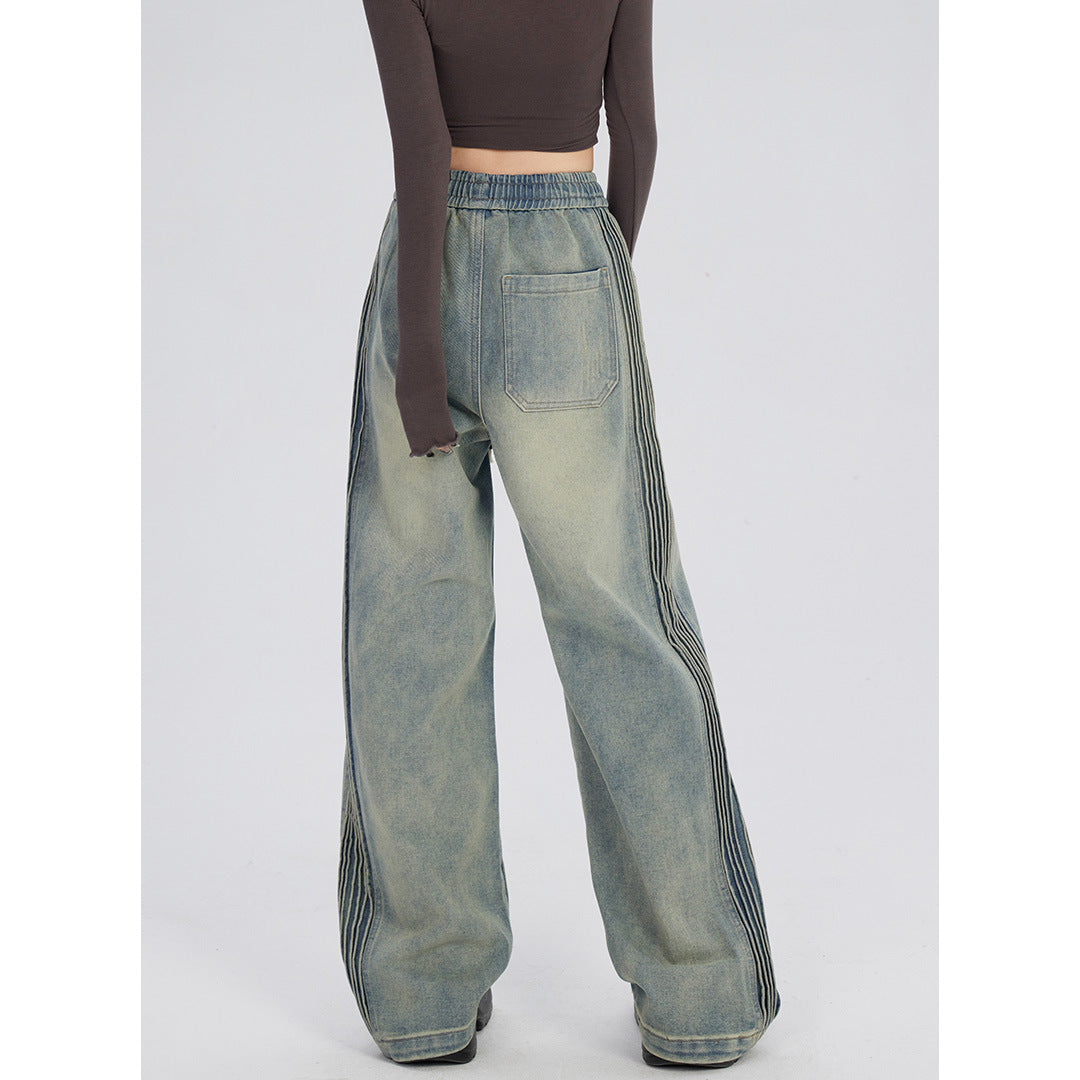 Jeans met elastische taille met rimpelontwerp aan de zijkant