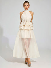 Vloeiende trouwjurk met ruches en een halterhalslijn