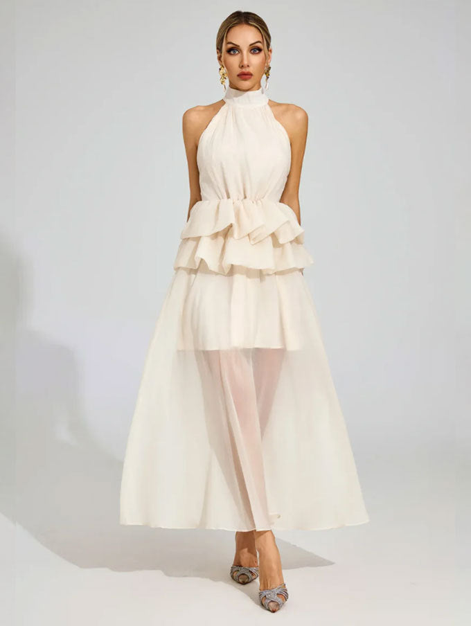 Vloeiende trouwjurk met ruches en een halterhalslijn