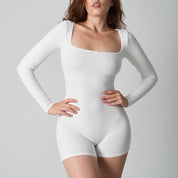 Kanten, nauwsluitende elastische bodysuit met vierkante hals en lange mouwen