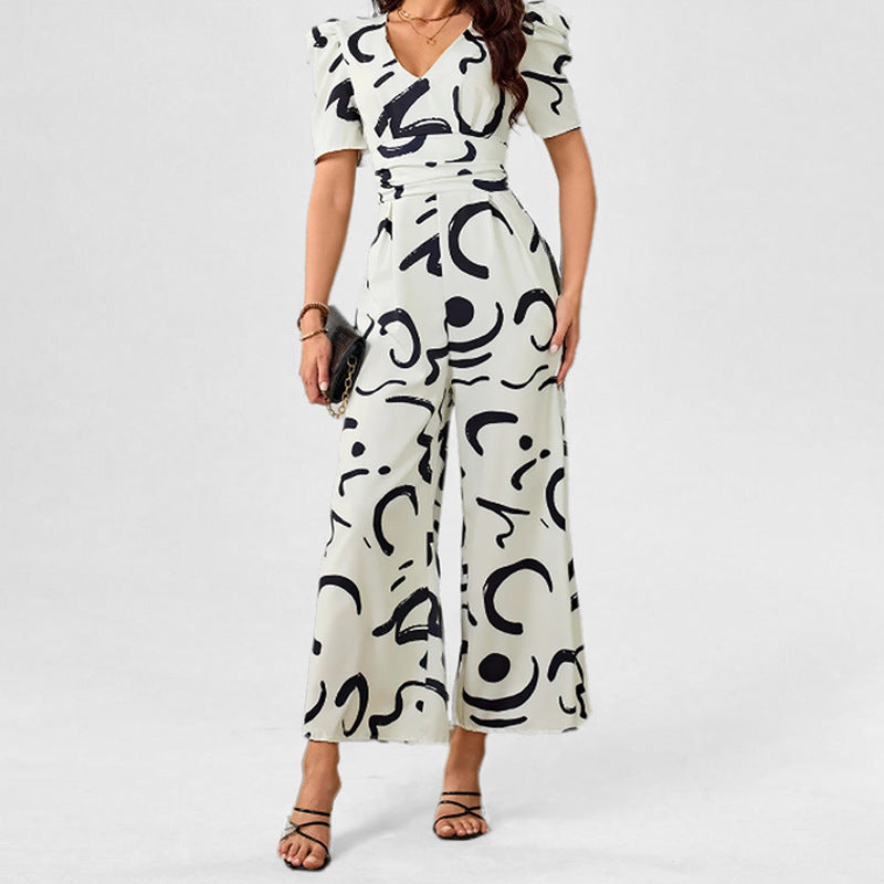 Stijlvolle en chique jumpsuit met V-hals en cindede taille en wijde pijpen