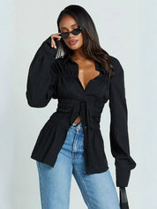 Stijlvolle elegante reversblouse voor dames met geplooide details en lange mouwen