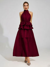 Vloeiende trouwjurk met ruches en een halterhalslijn