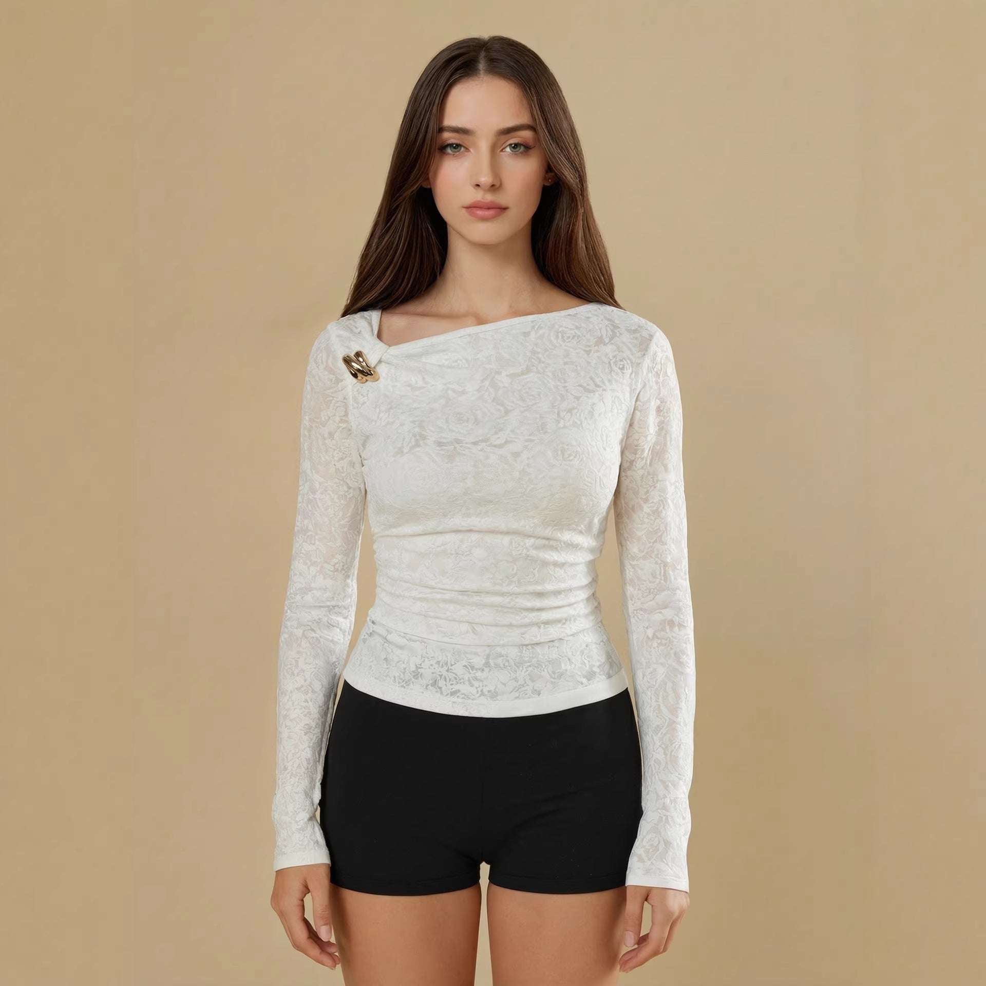 Nieuwe veelzijdige top met lange mouwen voor dames met een onregelmatig doorluidig ontwerp