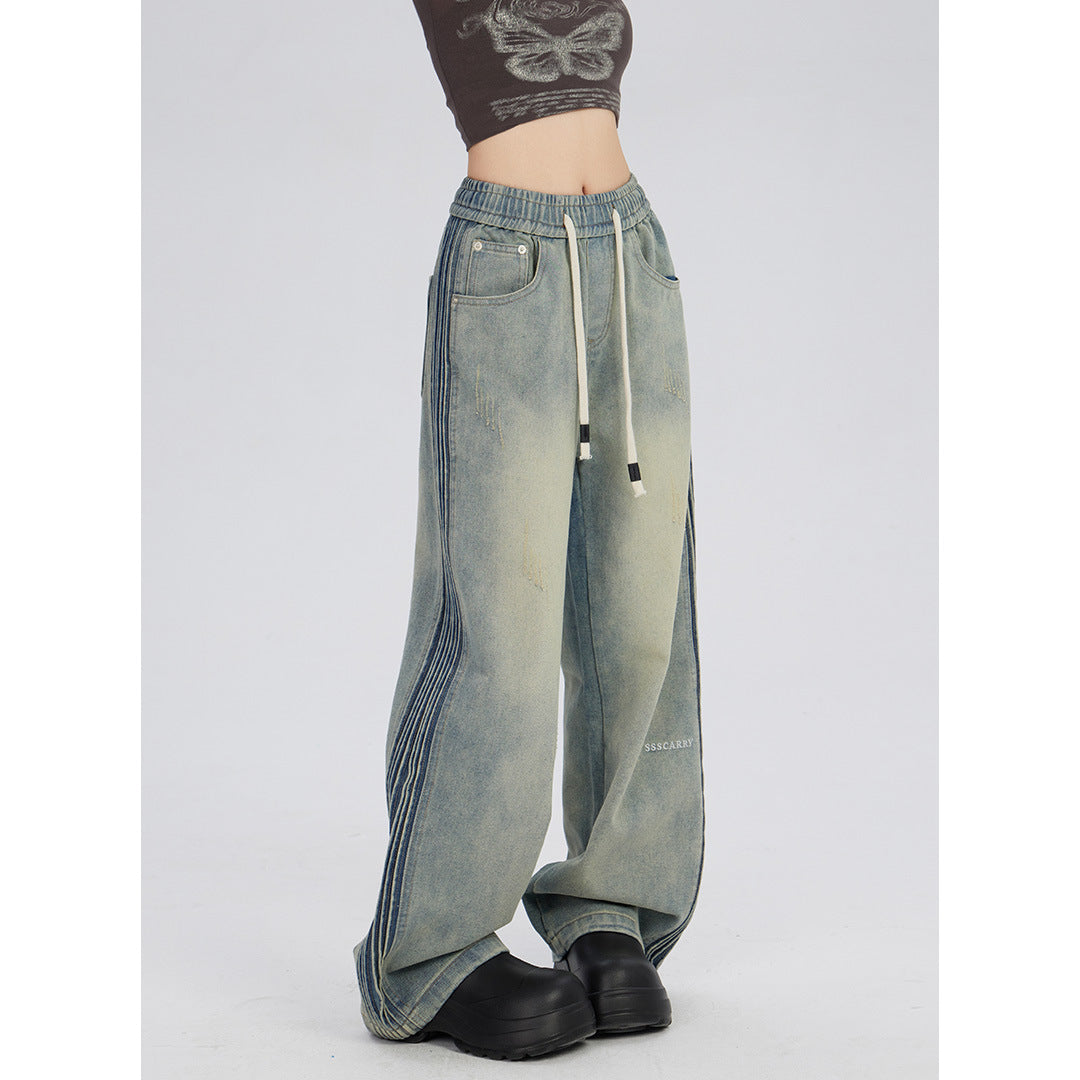 Jeans met elastische taille met rimpelontwerp aan de zijkant